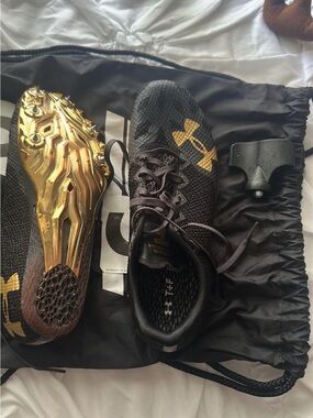 Under Armour Black Running Spikes with Gold Accents